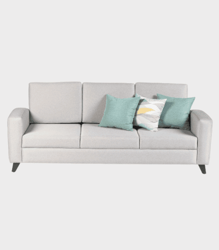 Sofá moderno de color gris con cojines turquesa y estampados, ideal para sala de estar o sala de televisión en el hogar.