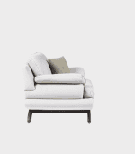 Sofá de diseño elegante en color blanco con cojín gris claro, ideal para decorar y brindar comodidad en cualquier espacio de tu hogar.