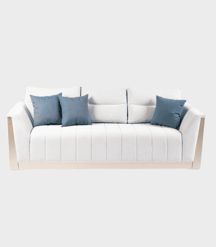 Sofá blanco de estilo moderno con cojines azules, ideal para sala de estar, combinando comodidad y decoración.