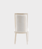 Butaca elegante con respaldo alto, tapizada en tela blanca, diseñada para brindarte comodidad y estilo en tu sala o comedor. Perfecta para crear espacios sofisticados y modernos.
