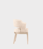 Asiento de mueble con respaldo acolchado en beige y patas de madera clara, diseñado para complementar oficinas y espacios de decoración moderna.