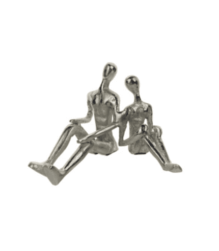 Chicas de metal decorativas sentadas, modernas y minimalistas que aportan estilo y elegancia a cualquier espacio de decoración.