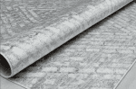 Blanco y gris alfombra de estilo moderno con textura suave y diseño elegante, ideal para decorar y dar confort a cualquier espacio.