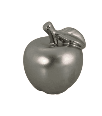Brass apple decorative piece with a shiny, metallic finish. Elegant and modern decor accessory for home or office spaces. Adds a contemporary touch to furniture and decoration accents. Perfect for minimalist styles.