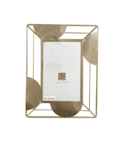 Marco de fotos decorativo con círculos dorados y estructura de metal, ideal para decorar mesas o estanterías. Perfecto para exhibir fotos o tarjetas en espacios modernos y elegantes.