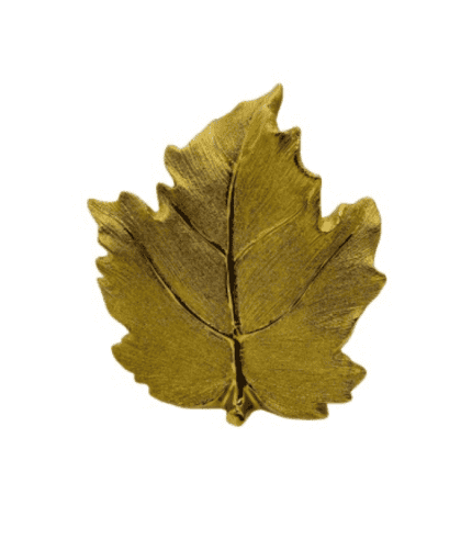 Hoja decorativa dorada en forma de árbol para decoración de interiores.