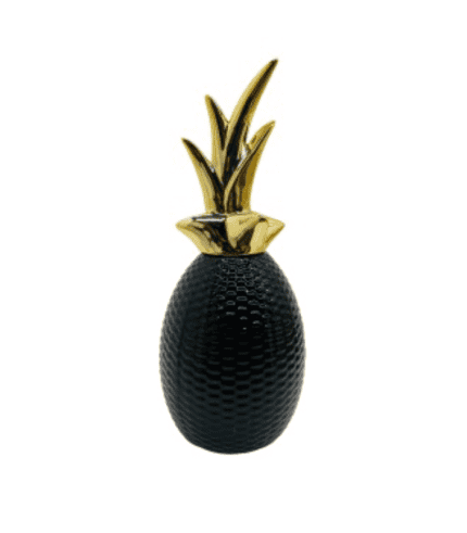 Poción de piña decorativa en negro y dorado, ideal para decorar espacios modernos con un toque original y sofisticado.