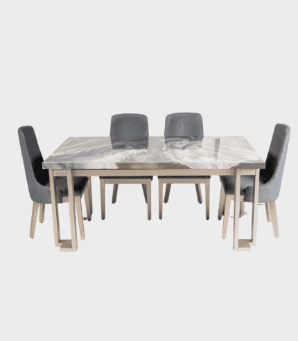 Mesa de comedor con tapa de mármol y sillas tapizadas en gris, ideal para decorar y modernizar espacios en zonas de muebles y decoración.