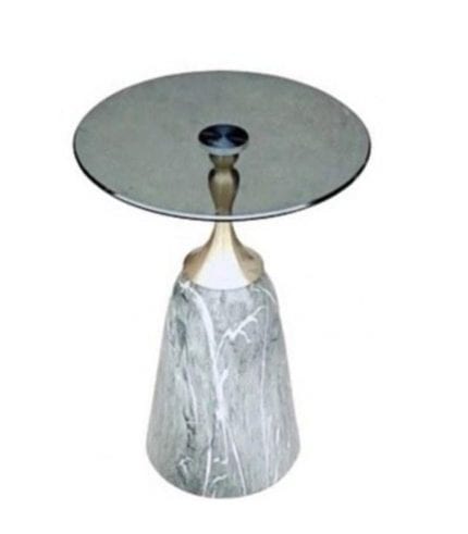 Mesa de centro moderna con base de mármol y superficie de vidrio redonda, ideal para decorar salas y espacios elegantes. Diseño sofisticado y funcional.