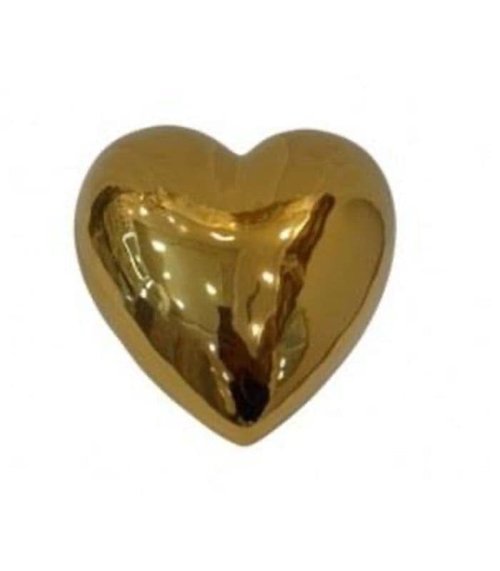 decoración (35) Brillo y sofisticación en decoración, corazón dorado como pieza destacada en muebles y accesorios de Zona Muebles.